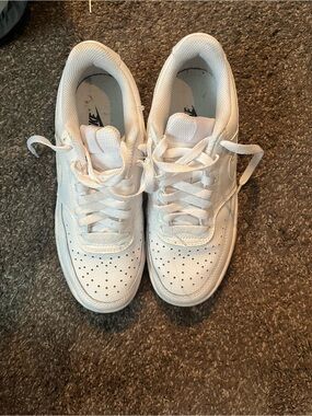 Nike women’s White Low-Top Sneakers with Perforated Toe